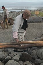 Tending the fire at the saltworks