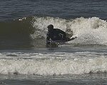 Seaside Oregon Surfers by the Lewis & Clark Saltmakers camp